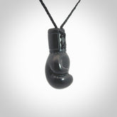 Hand carved boxing glove made from black jade. The cord is adjustable so that you can wear this where it suits you best. We ship these worldwide and the postage is included in the price.
